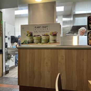 Plant Craft Kitchen - a view of the kitchen from the dining room - Vegan Near Me - St. Louis, Missouri