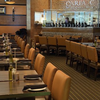 Carpaccio Tuscan Kitchen & Wine Bar - Carpaccio's warmly lit dining room and open kitchen in downtown Annapolis. - Italian Near Me - Annapolis, Maryland Carpaccio Tuscan Kitchen & Wine Bar - Carpaccio's warmly lit dining room and open kitchen in downtown Annapolis. - Italian Near Me - Annapolis, Maryland
