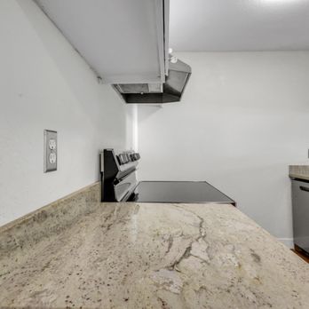UR Contractor - Premium kitchen renovation featuring brand-new stove installation and upgraded appliances, paired with high-quality granite countertops. - General Contractors Near Me UR Contractor - Premium kitchen renovation featuring brand-new stove installation and upgraded appliances, paired with high-quality granite countertops. - General Contractors Near Me