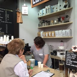 Retrogusto barista Martina in her shop at the central Market in Valencia. Amazing coffee