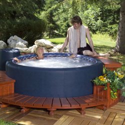 Backyard Leisure - Slide into a luxurious Softub