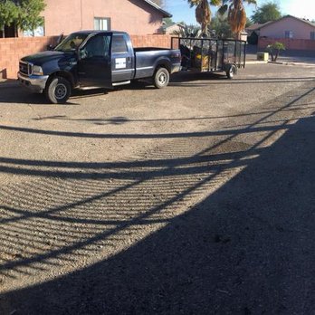 Property Clean-Up & Landscaping - a truck parked in a driveway - Landscaping Near Me - Marana, Arizona Property Clean-Up & Landscaping - a truck parked in a driveway - Landscaping Near Me - Marana, Arizona
