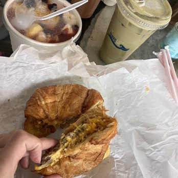 The Cliffs Cafe - The Cliffs Breakfast sandwich on croissant, l Tropical Blast acai bowl, and a matcha latte - Coffee & Tea Near Me - San Diego, California