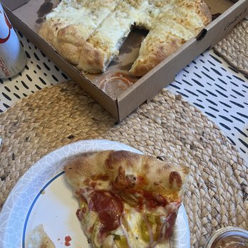 La Calavera Pizza - Slice of Pep it Up and Palos in the back. - Pizza Near Me - Atlanta, Georgia La Calavera Pizza - Slice of Pep it Up and Palos in the back. - Pizza Near Me - Atlanta, Georgia