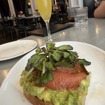 Iron Rose Bar & Restaurant - Avocado toast with "roasted tomato" - Breakfast & Brunch Near Me - Charleston, South Carolina Iron Rose Bar & Restaurant - Avocado toast with "roasted tomato" - Breakfast & Brunch Near Me - Charleston, South Carolina