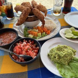 Restarutante Bar Doña Celia - Coconut Shrimp, Guacamole With Chips, bottles of Mexican Coca-Cola.