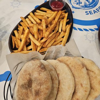 IBN Hamido Seafood - Fries and pita - Seafood Near Me - Astoria, New York IBN Hamido Seafood - Fries and pita - Seafood Near Me - Astoria, New York