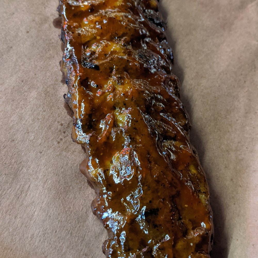Big Rascal BBQ & Grille - Baby-back ribs w/ extra sauce. - Barbeque Near Me - Ocala, Florida Big Rascal BBQ & Grille - Baby-back ribs w/ extra sauce. - Barbeque Near Me - Ocala, Florida