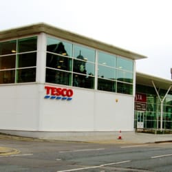 Tesco Superstore - Main facade on Westrn Road. Hardly a sympathetic neighbour to St Andrew's church behind...