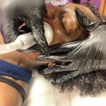 Sola Salon Studio - Facial Cavitation, this client is going for winkle reduction. - Hair Salons Near Me - Indianapolis, Indiana