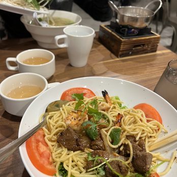Pho Saigon Pasteur - 1. Shabu style ribeye steak pho 2. Garlic noodles with shaken beef and grilled shrimp - Vietnamese Near Me - Alhambra, California