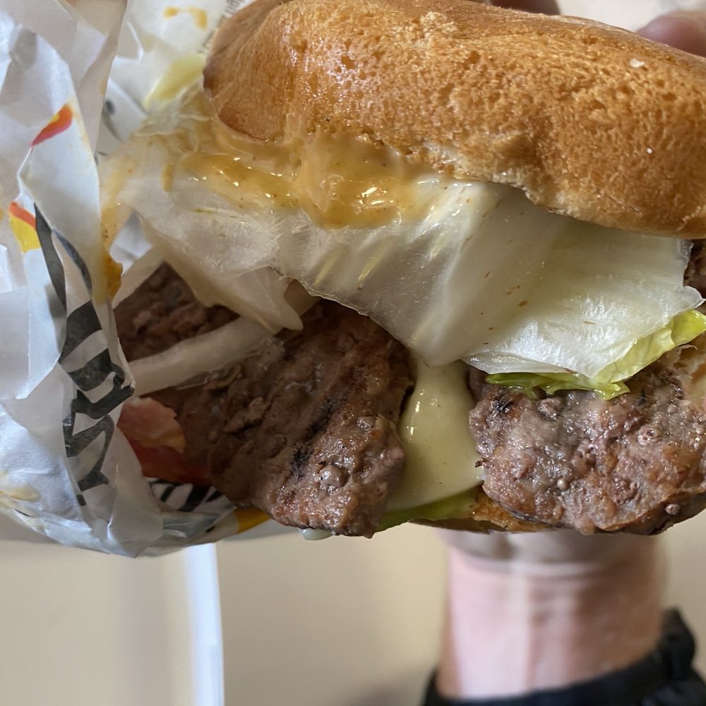 Carl's Jr - Two halves of a patties stuck onto one burger. For an $11 combo meal it just seemed lazy. - Burgers Near Me - Anchorage, Alaska Carl's Jr - Two halves of a patties stuck onto one burger. For an $11 combo meal it just seemed lazy. - Burgers Near Me - Anchorage, Alaska