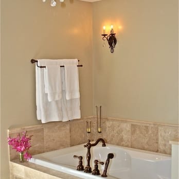 Greg Norman & Associates, Inc. - a bathtub and chandelier - General Contractors Near Me - Annandale, Virginia Greg Norman & Associates, Inc. - a bathtub and chandelier - General Contractors Near Me - Annandale, Virginia