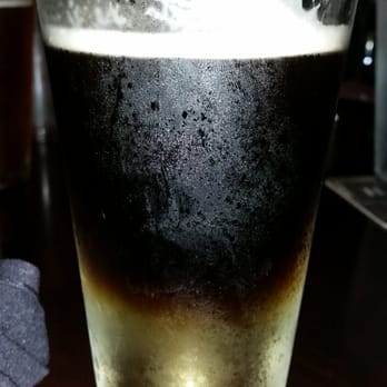 Yard House - Snakebite made with Guinness and pear cider - New American Near Me - Dallas, Texas Yard House - Snakebite made with Guinness and pear cider - New American Near Me - Dallas, Texas