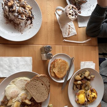 Rise & Grind - Starting at top left is King , Oreo French Toast , Corn Beef Hash, & Eggs Benedict. Also Hot Chocolate and Peanut Butter Truffle. - Coffee & Tea Near Me - Patchogue, New York