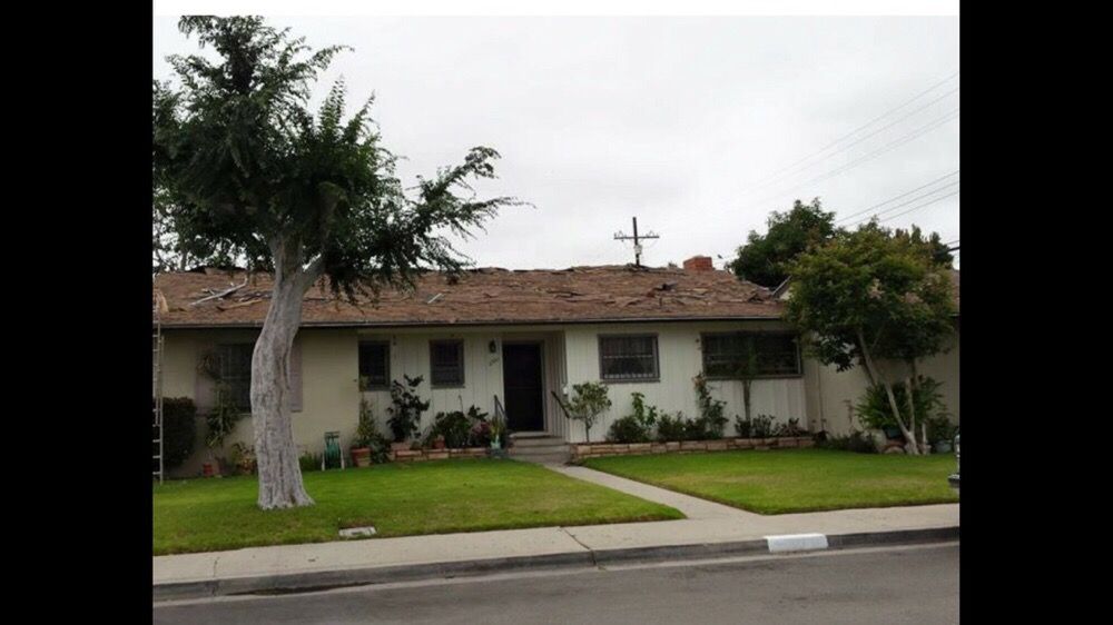 Slide of Fernandez Roofing