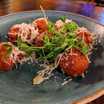 Jolly Pumpkin Artisan Ales + Kitchen - Cheddar beignets - too rich to eat more than two - Breweries Near Me - Dexter, Michigan Jolly Pumpkin Artisan Ales + Kitchen - Cheddar beignets - too rich to eat more than two - Breweries Near Me - Dexter, Michigan