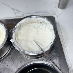 This is their version of tzatziki, but I don't know what kind of Goo goo  muck this is