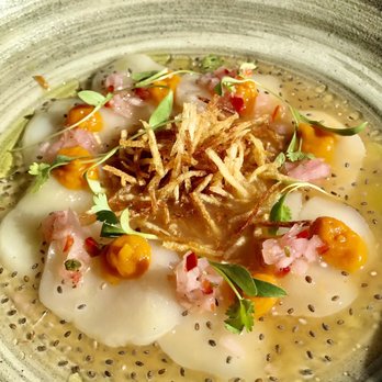 Kaiyo Rooftop - Scallop Tiradito. Passionfruit leche de tigre, potato shoestring, smoked yam puree, chia, red onion. - Peruvian Near Me - San Francisco, California Kaiyo Rooftop - Scallop Tiradito. Passionfruit leche de tigre, potato shoestring, smoked yam puree, chia, red onion. - Peruvian Near Me - San Francisco, California