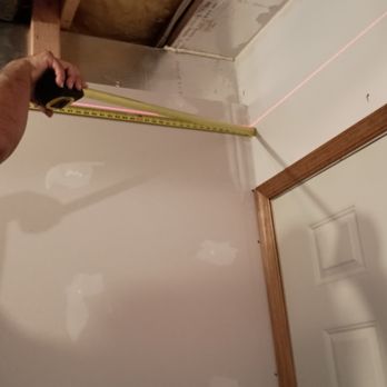 Prestigious Enterprises - Ernesto measuring using tape & laser 2 - Painters Near Me - Hagerstown, Maryland Prestigious Enterprises - Ernesto measuring using tape & laser 2 - Painters Near Me - Hagerstown, Maryland