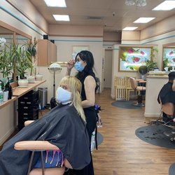 Customers and staff wearing face protection