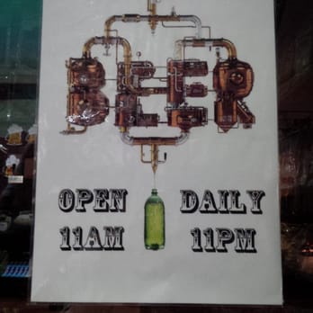 Tap Beer - a sign in a shop window - Beer, Wine & Spirits Near Me - Brooklyn, New York