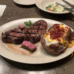 Joeys cut New York strip with loaded potato. Caesar salad was excellent. Cooked perfectly. Joeys cut New York strip with loaded potato. Caesar salad was excellent. Cooked perfectly.