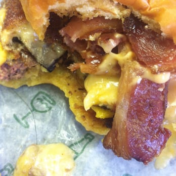 Shake Shack Garden State Plaza - Hair in burger and on the paper which my friend had already pulled out of his mouth. - Burgers Near Me - Paramus, New Jersey