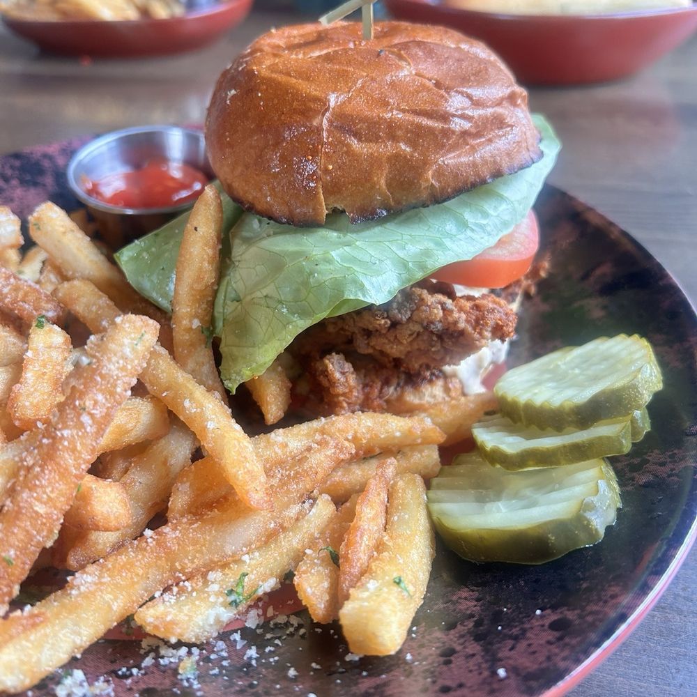 Brick and Bourbon - Fried chicken sandwich with Parmesan garlic fries - Cocktail Bars Near Me - Eden Prairie, Minnesota Brick and Bourbon - Fried chicken sandwich with Parmesan garlic fries - Cocktail Bars Near Me - Eden Prairie, Minnesota