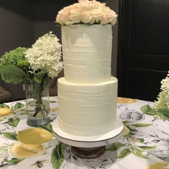 Something Sweet - a three tiered white wedding cake - Custom Cakes Near Me