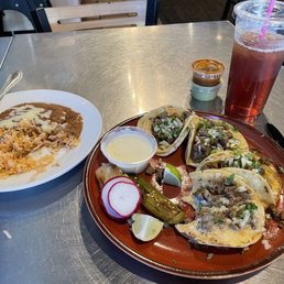 Combo 1 with all steak tacos, rice, and refried beans Combo 1 with all steak tacos, rice, and refried beans