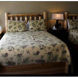 Warrensburg Inn & Suites - Guest Room 1 with custom made Queen-size cedar platform frames, Oliver & James by Jamison mattresses, new Air Conditioning and Heating Unit.