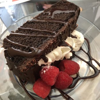 Taft Café - Chocolate cake with raspberries & cream - New American Near Me - Cincinnati, Ohio Taft Café - Chocolate cake with raspberries & cream - New American Near Me - Cincinnati, Ohio