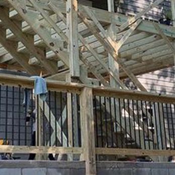 Prestige Exteriors - a house being built with a wooden structure - General Contractors Near Me - Roswell, Georgia Prestige Exteriors - a house being built with a wooden structure - General Contractors Near Me - Roswell, Georgia