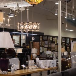 My Sister's Attic - A selection of light fixtures and painting in-store.