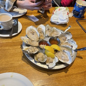 Angelo’s Taverna - Dozen of happy hour oysters - Italian Near Me - Denver, Colorado Angelo’s Taverna - Dozen of happy hour oysters - Italian Near Me - Denver, Colorado
