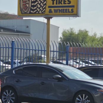 B & J Tires & Wheels - The sign you can't miss off the street - Tires Near Me - Oakland, California