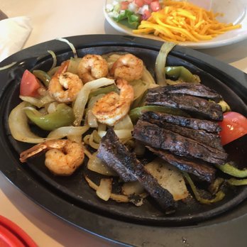El Chico - The fajitas were beef and shrimp. - Mexican Near Me - Rockwall, Texas El Chico - The fajitas were beef and shrimp. - Mexican Near Me - Rockwall, Texas