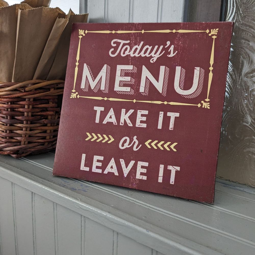 66 Diner - a sign that reads today's menu take it or leave it - Greek Near Me - Winston-Salem, North Carolina