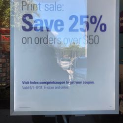 FedEx Office Print & Ship Center - Ad on door