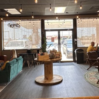 Planet Coffee & Tea - a woman sitting in a coffee shop - Coffee & Tea Near Me - Flowood, Mississippi Planet Coffee & Tea - a woman sitting in a coffee shop - Coffee & Tea Near Me - Flowood, Mississippi