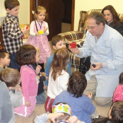 Feiler Dental Associates of Wanaque - Dr. Feiler having fun with pediatric patients as well as educating them about oral health during Kids Day