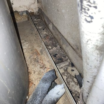 Hidden Oaks Apartments - This is what the water heater room may look like due to extensive water damage and leaks that are NEVER ADDRESSED. - Apartments Near Me - San Antonio, Texas Hidden Oaks Apartments - This is what the water heater room may look like due to extensive water damage and leaks that are NEVER ADDRESSED. - Apartments Near Me - San Antonio, Texas