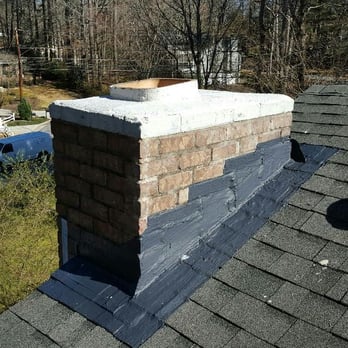Ambassador Property Services - Waterproofed the crown and protected the chimney by providing a waterproof seal from the bricks to the roof. - Window Washing Near Me