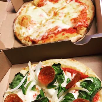 Rockit's Famous Pizza - pepperoni and spinach - Pizza Near Me - Bloomington, Indiana Rockit's Famous Pizza - pepperoni and spinach - Pizza Near Me - Bloomington, Indiana