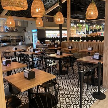 Rokka's Market - Restaurant seating inside the store - Brazilian Near Me - Windermere, Florida