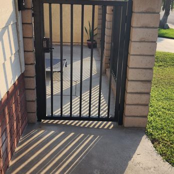 Cara Ironworks - After. Front gate with combo lock on both sides. - Fences & Gates Near Me - Montclair, California