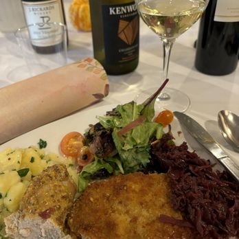 Tisza Bistro - Schnitzel, German Potato Salad, Sausage Cabbage Salad and Green Salad. - Modern European Near Me - Healdsburg, California Tisza Bistro - Schnitzel, German Potato Salad, Sausage Cabbage Salad and Green Salad. - Modern European Near Me - Healdsburg, California