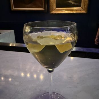 The Nightwatch Lounge - THE NIGHTWATCH GENEVER, DRY VERMOUTH, ACID, PHOSPHATE, ABSINTHE, LEMON TWIST - Cocktail Bars Near Me - Grand Rapids, Michigan