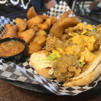 Flying Fish Taphouse - Flying Fish Tap House - Oyster Po'Boy sandwich with fries and gumbo. - Seafood Near Me - Jacksonville, Florida